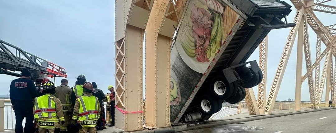 At around 12P.M. on Friday, March 1, 2024, rescue crews responded to a high-angle rescue on the Clark Memorial Bridge. They immediately assessed the scene and began rescue operations to save a semi-truck driver who was still in the cab of her truck hanging off the bridge over the Ohio River. Through their swift and proficient maneuvering, they safely rescued the victim in about 40 minutes.