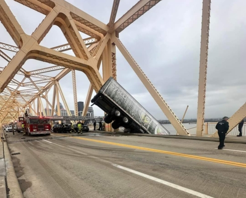 At around 12P.M. on Friday, March 1, 2024, rescue crews responded to a high-angle rescue on the Clark Memorial Bridge. They immediately assessed the scene and began rescue operations to save a semi-truck driver who was still in the cab of her truck hanging off the bridge over the Ohio River. Through their swift and proficient maneuvering, they safely rescued the victim in about 40 minutes.