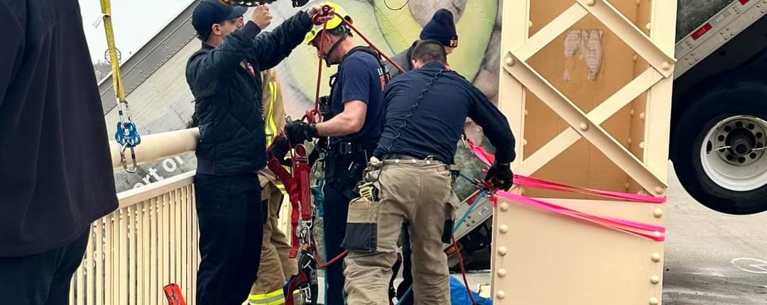 At around 12P.M. on Friday, March 1, 2024, rescue crews responded to a high-angle rescue on the Clark Memorial Bridge. They immediately assessed the scene and began rescue operations to save a semi-truck driver who was still in the cab of her truck hanging off the bridge over the Ohio River. Through their swift and proficient maneuvering, they safely rescued the victim in about 40 minutes.