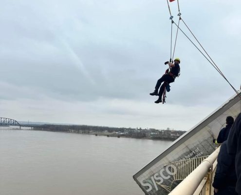 At around 12P.M. on Friday, March 1, 2024, rescue crews responded to a high-angle rescue on the Clark Memorial Bridge. They immediately assessed the scene and began rescue operations to save a semi-truck driver who was still in the cab of her truck hanging off the bridge over the Ohio River. Through their swift and proficient maneuvering, they safely rescued the victim in about 40 minutes.