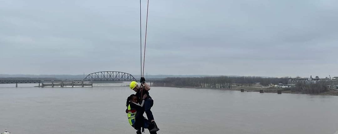 At around 12P.M. on Friday, March 1, 2024, rescue crews responded to a high-angle rescue on the Clark Memorial Bridge. They immediately assessed the scene and began rescue operations to save a semi-truck driver who was still in the cab of her truck hanging off the bridge over the Ohio River. Through their swift and proficient maneuvering, they safely rescued the victim in about 40 minutes.