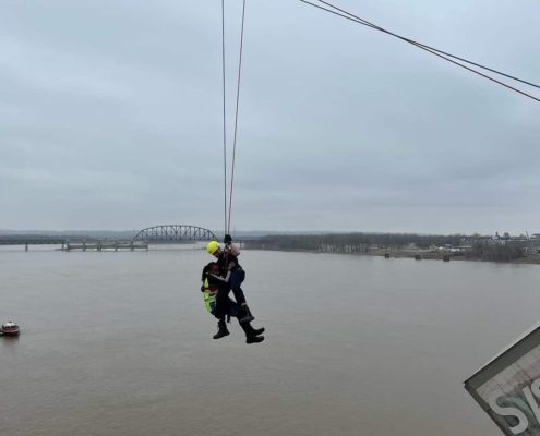 At around 12P.M. on Friday, March 1, 2024, rescue crews responded to a high-angle rescue on the Clark Memorial Bridge. They immediately assessed the scene and began rescue operations to save a semi-truck driver who was still in the cab of her truck hanging off the bridge over the Ohio River. Through their swift and proficient maneuvering, they safely rescued the victim in about 40 minutes.