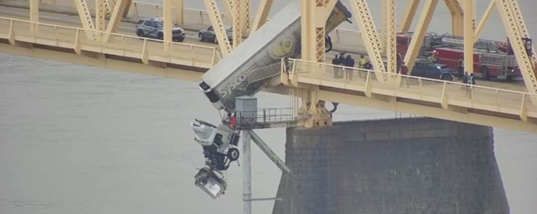 At around 12P.M. on Friday, March 1, 2024, rescue crews responded to a high-angle rescue on the Clark Memorial Bridge. They immediately assessed the scene and began rescue operations to save a semi-truck driver who was still in the cab of her truck hanging off the bridge over the Ohio River. Through their swift and proficient maneuvering, they safely rescued the victim in about 40 minutes.