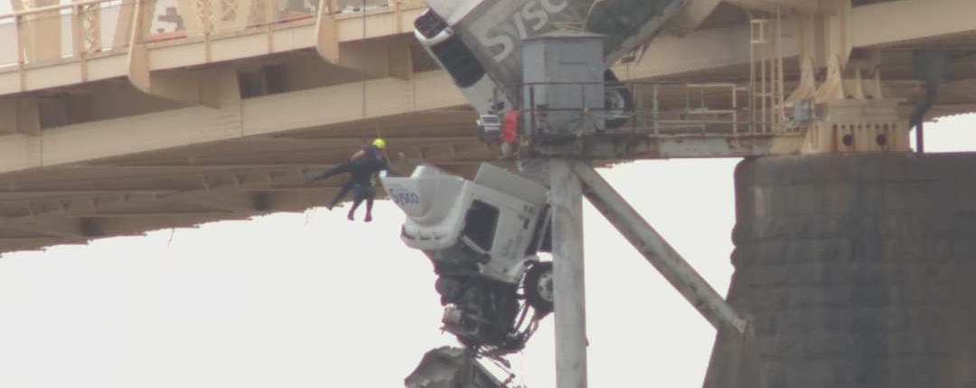 At around 12P.M. on Friday, March 1, 2024, rescue crews responded to a high-angle rescue on the Clark Memorial Bridge. They immediately assessed the scene and began rescue operations to save a semi-truck driver who was still in the cab of her truck hanging off the bridge over the Ohio River. Through their swift and proficient maneuvering, they safely rescued the victim in about 40 minutes.